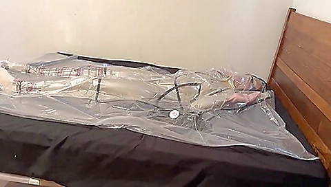 Busty teen in a latex trench coat is getting a bondage brahe